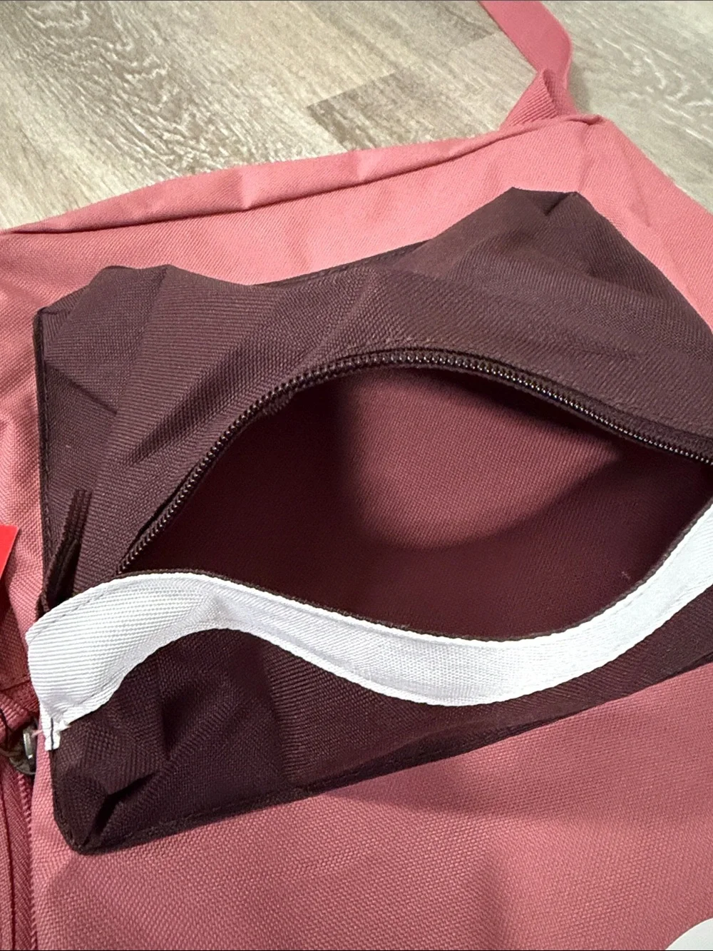 Nike Rose Pink Backpack with Dark Brown Front Pocket and White Logo